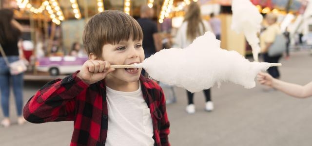 boy enjoying cotton candy