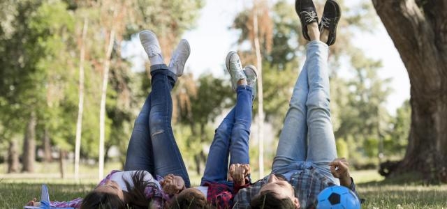 parents child spending time outdoors together